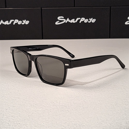 Rectangular faced Black sunglasses with gray lenses. Sharpeye Shades Brand