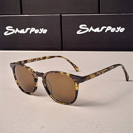 Round keyhole frame Sunglasses with tortoiseshell frame and brown lenses Sharpeye Shades' brand.